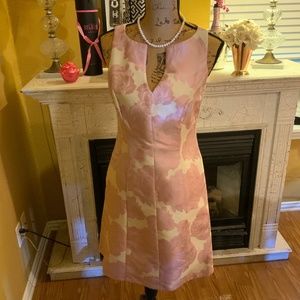 Rosettes are still all the Rage ! Perfectly pretty dress .